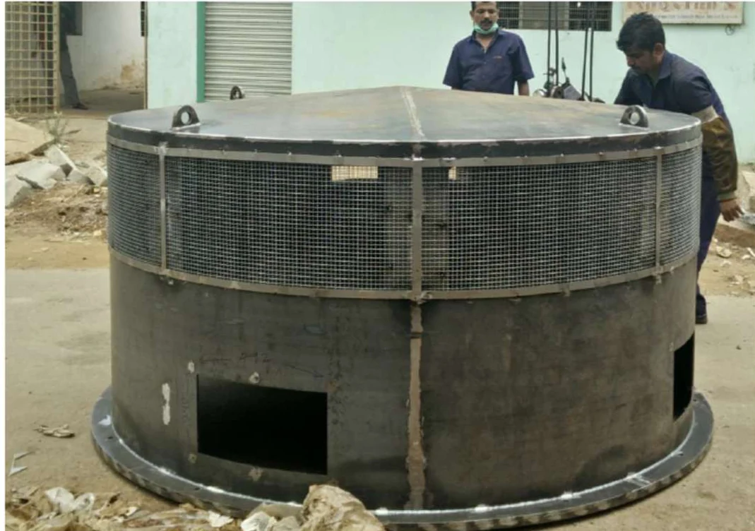 Vertical motor fan cover during fabrication